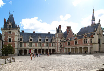 Blois Royal Castle, France. View from the courtyard of the palace of Louis XII and the chapel of Saint-Calais 