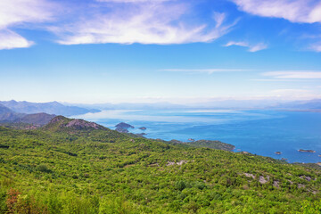 Beautiful Mediterranean landscape with lake on sunny spring day. National Park Lake Skadar, Montenegro