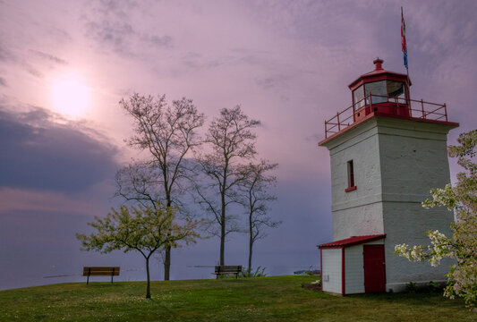 The sun sets over Lake Huron as seen from the historic Goderich Lighthouse.