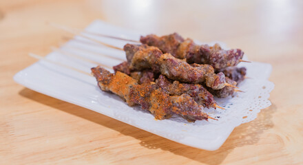 A dish of Roast Beef Kebabs is on the table