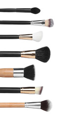 Set with different makeup brushes for applying cosmetic products on white background. Vertical banner design