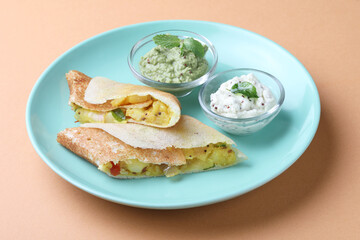 masala dosa with coconut and mint chutney. South Indian food