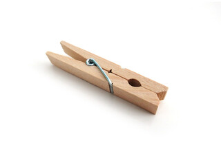 Aerial view of clothespin isolated. Close up of natural wooden clothes pin on white background. Laundry and Home Accessories.