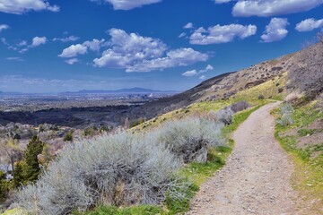 Grandeur Peak hiking trail loop views spring back around Bonneville Shoreline Pipe Line Overlook...