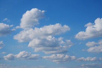 Naklejka na ściany i meble Blue sky and white clouds on natural daylight background