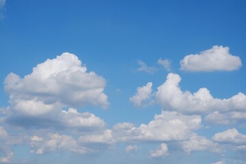 Naklejka na ściany i meble White clouds and blue sky on natural daylight background