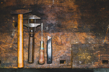 old rusty metal tools with a hammer
