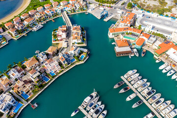 Top down view of marina piers and artificial island