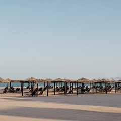 Beautiful lounge pavilion canopy for relax on the beach with sea side view and blue sky. Tent made...