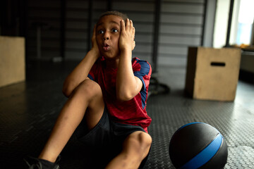 True human emotions, reaction and body language. Emotional funny dark skinned little boy in...