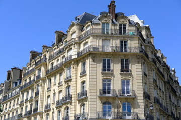 Fototapeta na wymiar The facade of a Parisian building. France, the 22th May 2021.