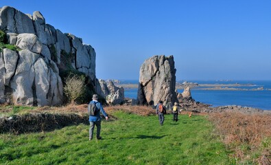 Senior hikers on the GR34 path in Brittany. France