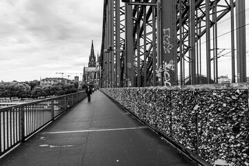 COLOGNE, GERMANY, 23 JULY 2020:  Black and white view of the Hohenzollern Bridge with thousands of lockers symbol of love