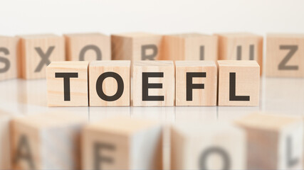 toefl - server message block - letters on wooden cubes on white background