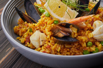 Pilaf with seafood and vegetables, close up