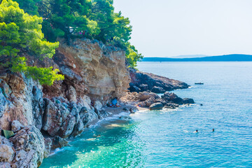 HVAR, CROATIA, AUGUST 8 2019: The beautiful and crystal water of Jagodna Beach in Hvar Island, Adriatic Sea - obrazy, fototapety, plakaty