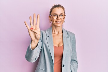 Beautiful caucasian woman wearing business jacket and glasses showing and pointing up with fingers number four while smiling confident and happy.