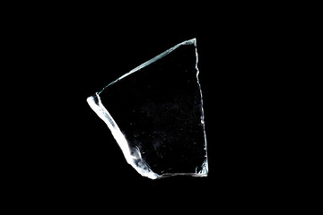 natural glass shard insulated on a black background