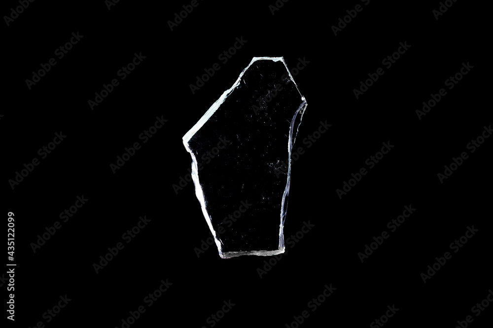 Poster glass fragments in isolation on a black background. damaged window. damaged object