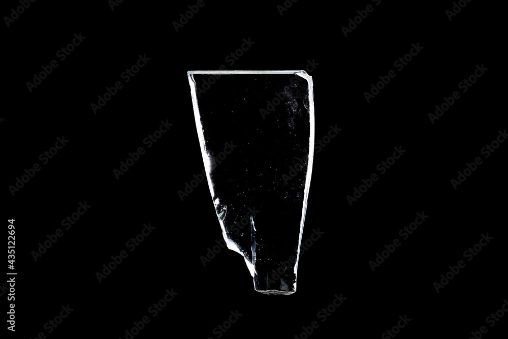Poster glass fragments in isolation on a black background. damaged window. damaged object