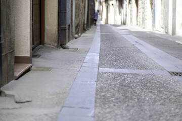 Older woman on the street of a village