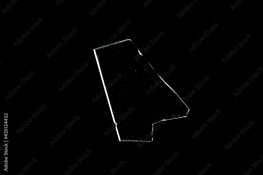 Poster glass fragments in isolation on a black background. damaged window. damaged object