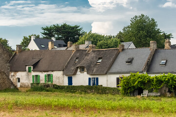 Fototapeta na wymiar Brittany, Ile aux Moines island in the Morbihan gulf, thatched cottage and houses in the village