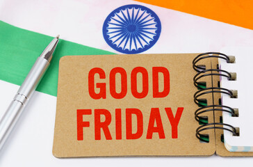 Against the background of the flag of India lies cardboard with the inscription - good friday
