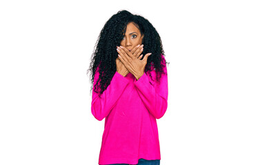 Middle age african american woman wearing casual clothes shocked covering mouth with hands for mistake. secret concept.