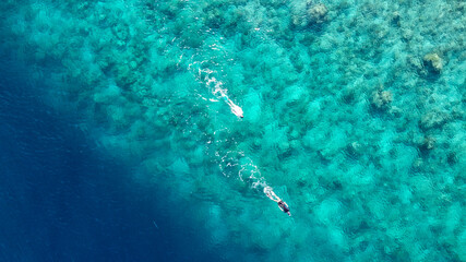 Maldives resort island drone aerial view, Indian ocean atoll nature beach and palm forest, leisure tourist luxury vacation