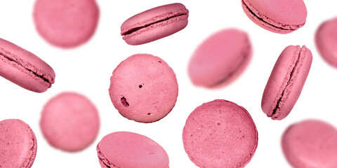 Pink Macarons. French Dessert, Selective Focus. Falling Macaroons isolated on White Background. 