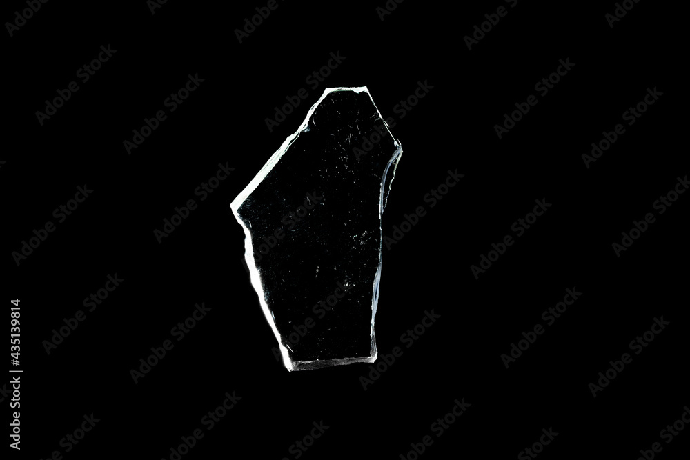 Poster glass fragments in isolation on a black background. damaged window. damaged object