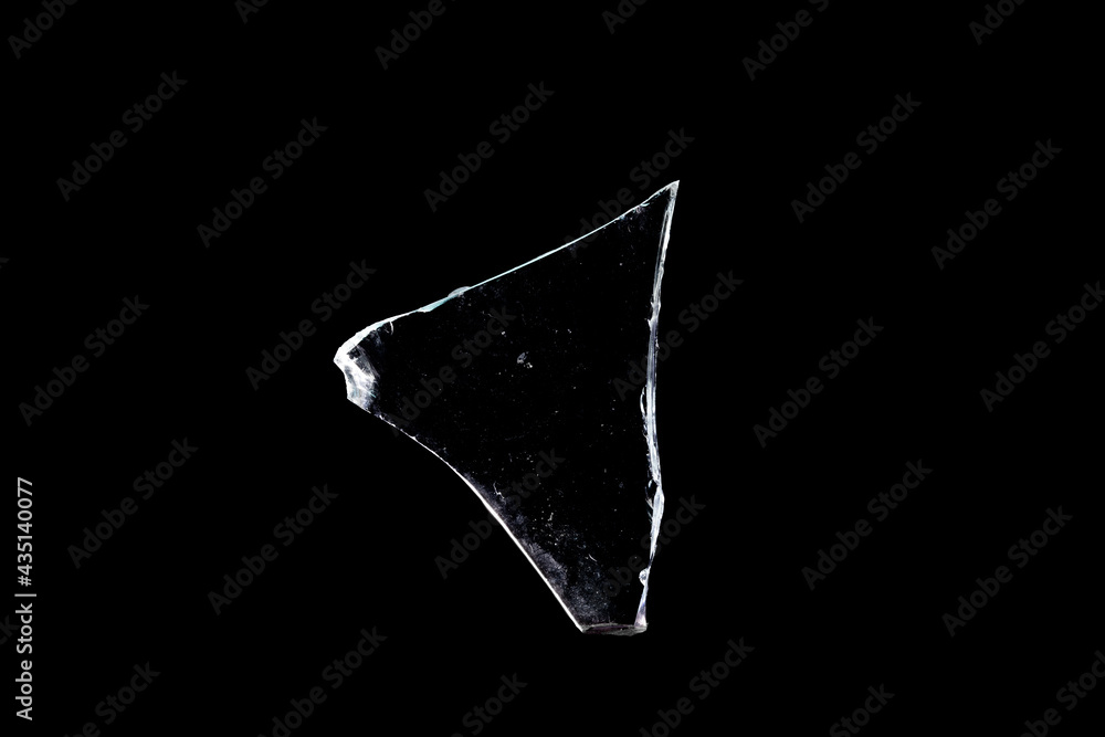 Poster glass fragments in isolation on a black background. damaged window. damaged object