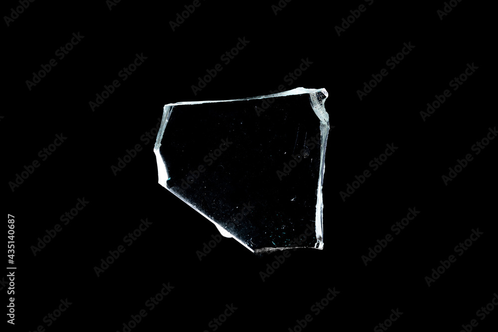Poster glass fragments in isolation on a black background. damaged window. damaged object