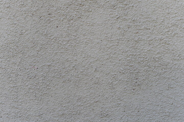 Fototapeta premium White rough texture of cement facade detail. background