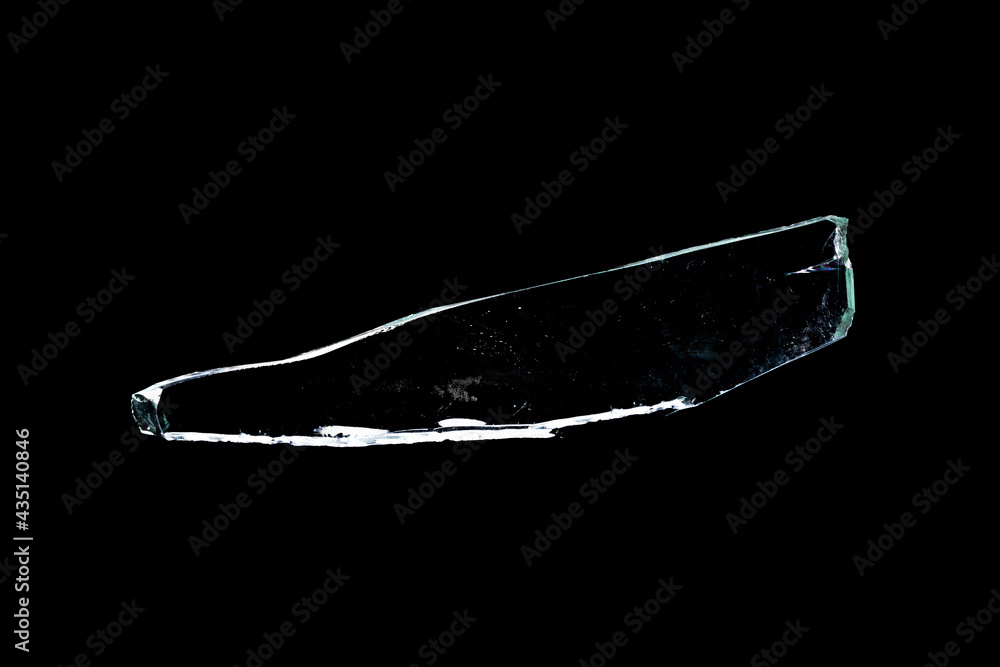 Poster glass fragments in isolation on a black background. damaged window. damaged object