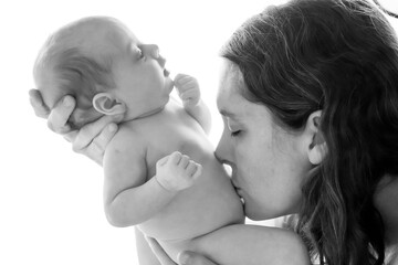 Beautiful baby in mothers arms