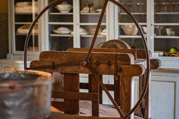 Detail of the interior of a vintage kitchen. Colonial house. Furniture with vintage utensils.