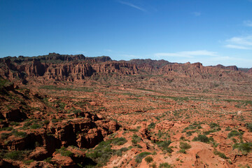 Prehistoric Cliffs in Sierra de las Quijadas National Park. Arid desert landscape. Red sandstone, hills, canyon and valley view