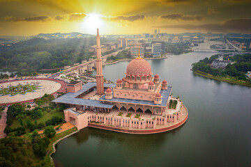 Aerial View Of Putra Mosque with Putrajaya City Centre with Lake at sunset in Putrajaya, Malaysia. - Powered by Adobe