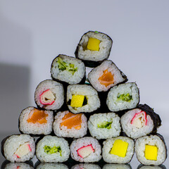 sushi pyramid with white background
