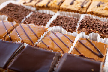 A closeup view of a tray of assorted Armenian cakes.