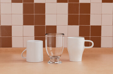 2 coffee mugs and single water glass side by side on kitchen countertop with wall, close up front view, 3d rendering, no people