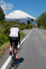 A Rider enjoying cycling towards the mountain