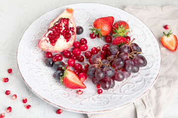 Various fresh forest berries on white background. Organic food concept.
