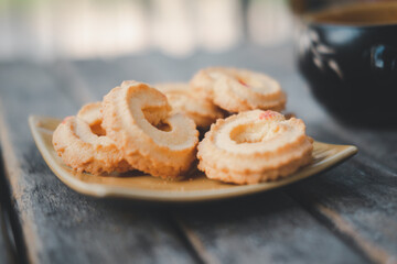 Butter cookies, close up on the rustic wooden table