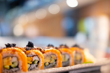 Salmon roll topped foie gras. Japanese food style.