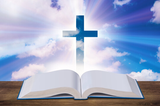 Religious concept with cross and bible book