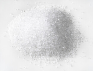 pile of fructose crystalline sugar on white