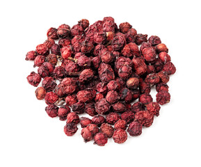 pile of dried magnolia berries closeup on white
